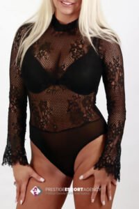 Woman in lace bodysuit